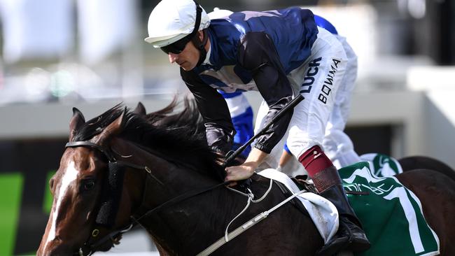 Jockey Hugh Bowman rides Salsonic to win race 5, the Queensland Guineas, during Stradbroke Day at Doomben racecourse in Brisbane, Saturday, June 10, 2017. (AAP Image/Dan Peled) NO ARCHIVING, EDITORIAL USE ONLY