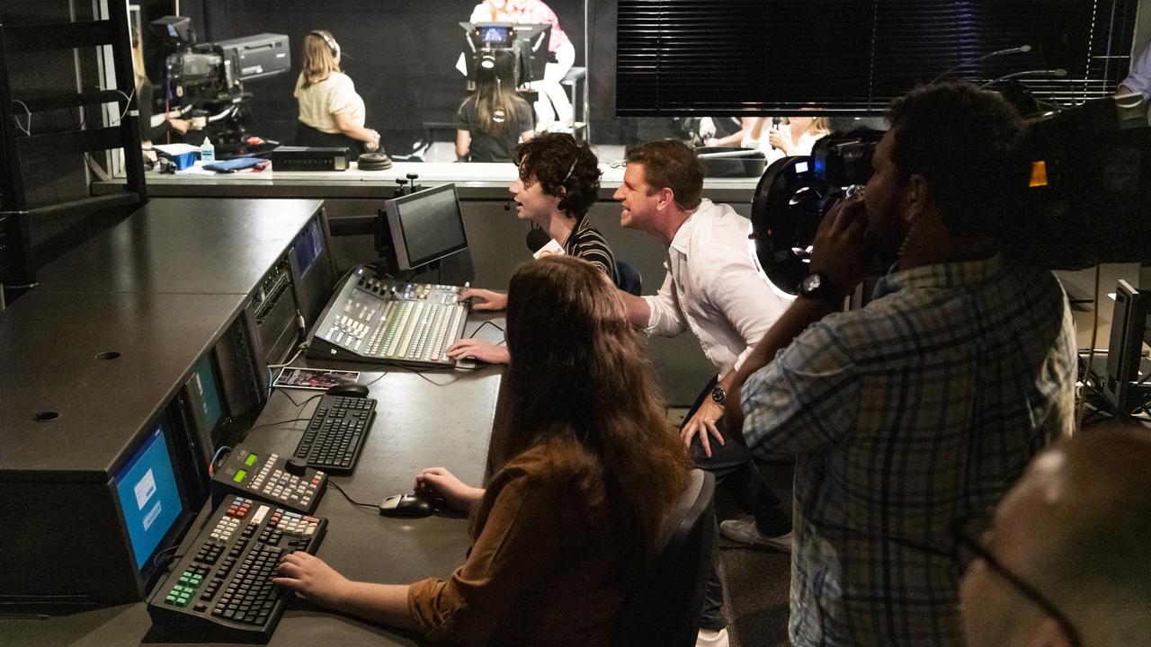 Sunrise weatherman Sam Mac with students at Bond University. Picture: Cavan Flynn/Bond University.