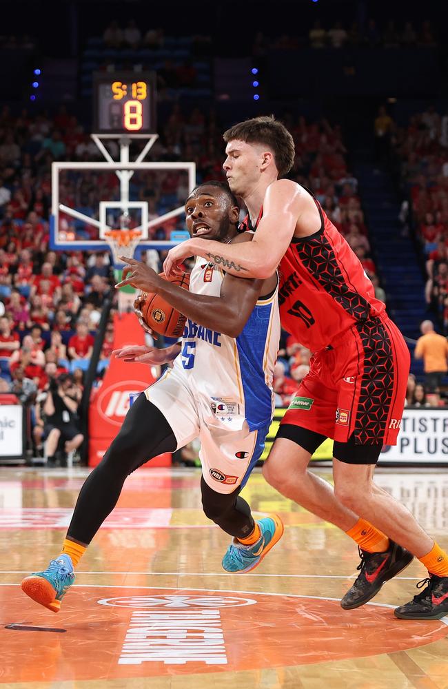 James Batemon of the Bullets is fouled by Ben Henshall of the Wildcats. Picture: Getty Images