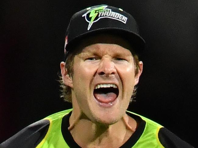 Shane Watson of the Thunder celebrates after catching out Ben Cutting of the Heat during the Big Bash League (BBL) cricket match between the Brisbane Heat and the Sydney Thunder at the Gabba in Brisbane, Wednesday, December 27, 2017. (AAP Image/Darren England) NO ARCHIVING, EDITORIAL USE ONLY