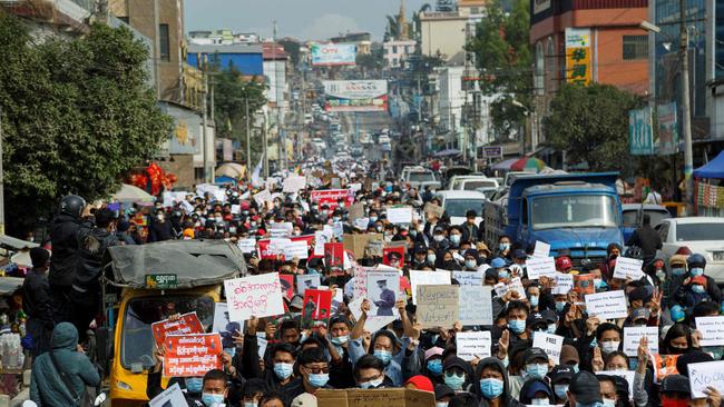 People take part in a demonstration against Myanmar’s 2021 military coup in Muse near the China-Myanmar. Picture: AFP