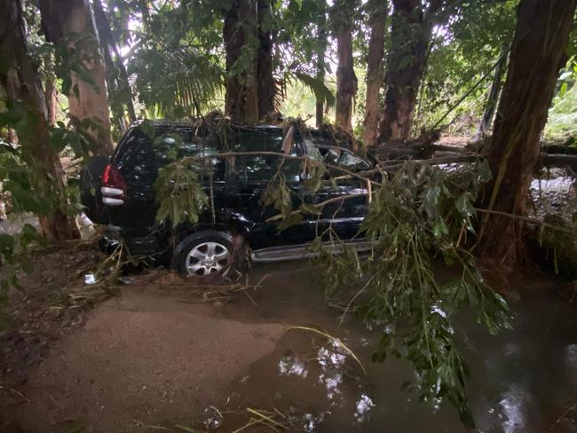 Sandra Goeldner and Wade Stafford's vehicle was written off after it was tossed around in the fast moving floodwaters at Finch Hatton. Picture supplied by Sandra Goeldner