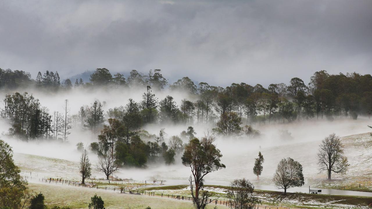 Properties at Long Flat south of Gympie resemble snowfields after a super cell dumped hail, tore down trees and caused devastation across the Burnett and South East. Photo Lachie Millard