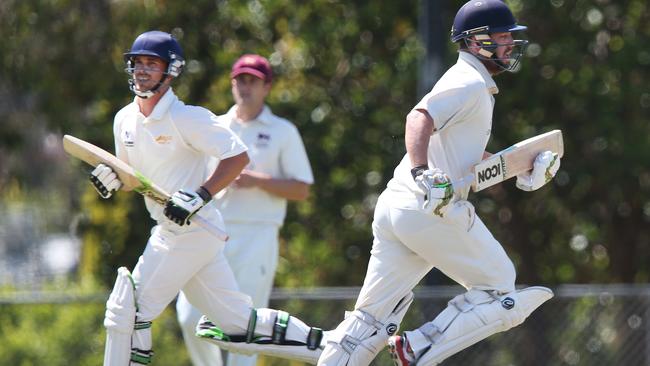 Matthew King (L) and David King (R) run between wickets for Ringwood in 2017. Picture: David Crosling