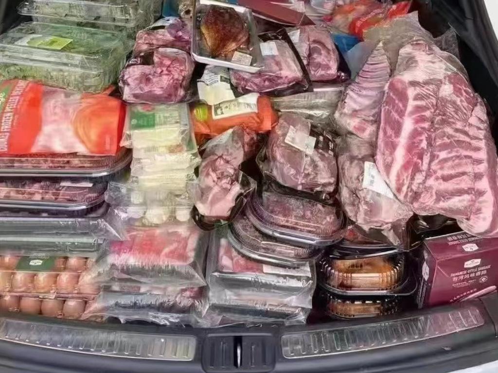 A car boot packed full of meat in Chengdu. Picture: Twitter