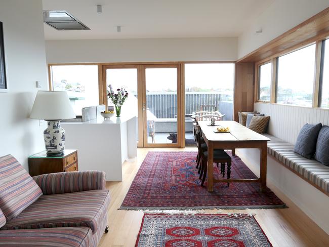 The open dining area, where bench seating has been used to save space.