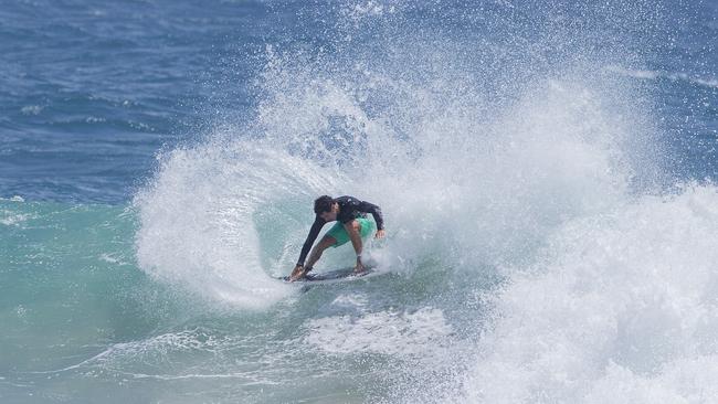 Surfers enjoying the larger swell at Snapper Rocks on Sunday 2 January 2022. Picture: Jerad Williams