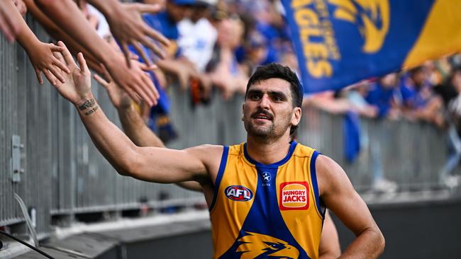 Tom Cole celebrates the win with fans. Photo by Daniel Carson/AFL Photos via Getty Images