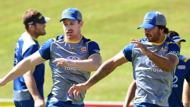 Michael Morgan completes light duties alongside Johnathan Thurston. Picture: Evan Morgan