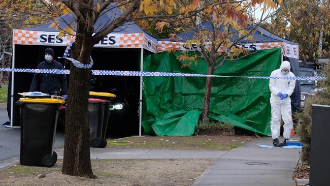 A crime scene was set up around the BMW as detectives combed the area on Sunday. Picture: NCA NewsWire /Luis Enrique Ascui