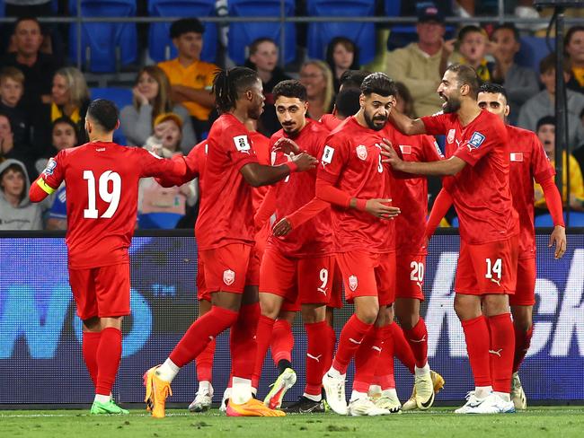 Bahrain players celebrate at Robina Stadium. Picture: Chris Hyde/Getty Images