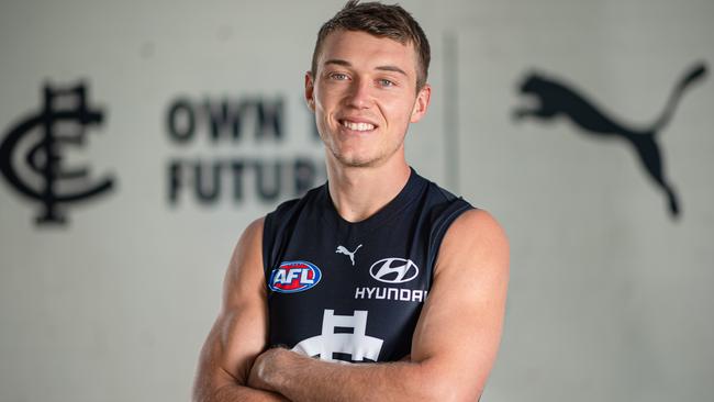 Carlton co-captain Patrick Cripps tries on the Blues’ new 2020 jumper. Picture: Jason Edwards