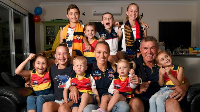 Greg Phillips pictured with his daughter Erin who is playing in the Crows grand final this weekend and grandchildren — (back from left) Ky, Jemma, Percy, Chloe, (front, from left) Leni, Ashlee, Blake and Brooklyn (Erin's children) and Nixie. Picture: Tricia Watkinson