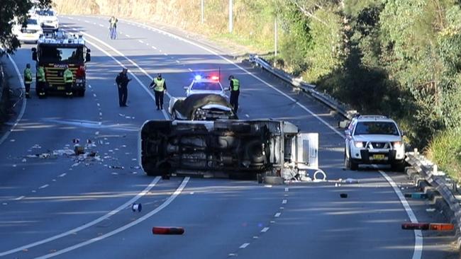 Alfords Point Rd was closed in both directions on Friday morning as investigations got underway. Picture: TNV