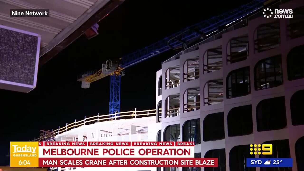 Police negotiate with man in crane