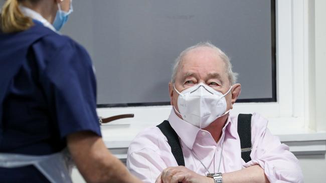 A man prepares to receive a dose of AstraZeneca coronavirus disease vaccine at the Pentland Medical Practice in Currie, Scotland. Picture: Getty Images