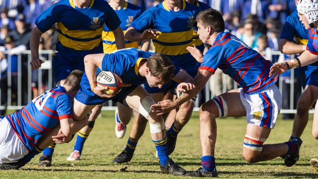 Bud Smith with the ball for Grammar against Downlands in O'Callaghan Cup. Picture: Kevin Farmer