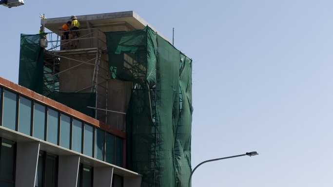 Stripping back the grime on the old Commonwealth Bank building in the Toowoomba CBD. Picture: Kevin Farmer