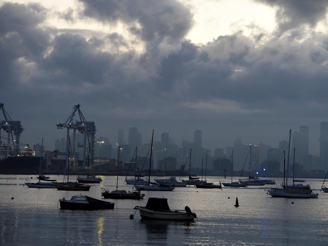 The early morning view of the city from Williamstown on the day of the winter solstice. Picture: Andrew Henshaw