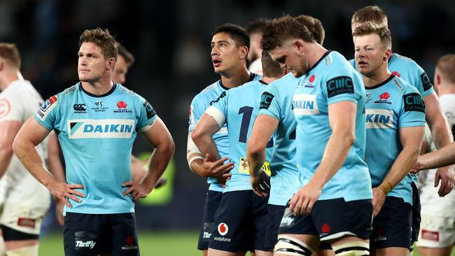 Dejected Waratahs after their loss to the Sharks. Picture: Getty