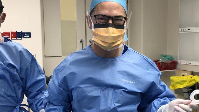 Dr Philip Gan in surgery.