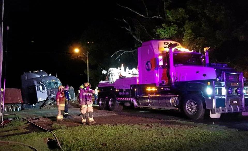 Two trucks collided at Ulmarra late Tuesday night with one hitting a muddy embankment. Picture: John Leask