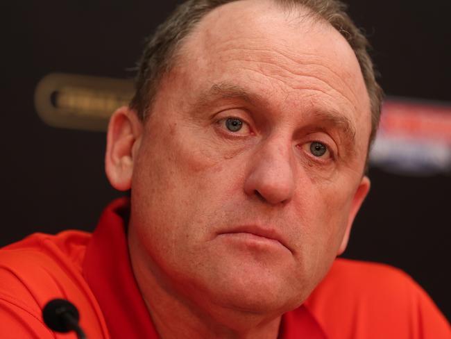 MELBOURNE, AUSTRALIA - SEPTEMBER 28: John Longmire, Senior Coach of the Swans speaks to the media after the AFL Grand Final match between Sydney Swans and Brisbane Lions at Melbourne Cricket Ground, on September 28, 2024, in Melbourne, Australia. (Photo by Robert Cianflone/AFL Photos via Getty Images)