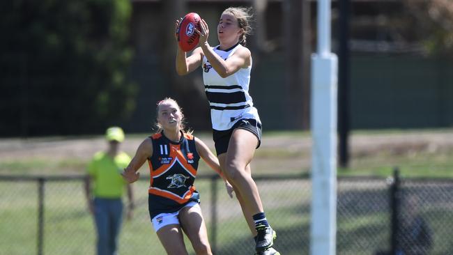 Ellie McKenzie marks in front of Tamsin Crook. Picture: Julian Smith