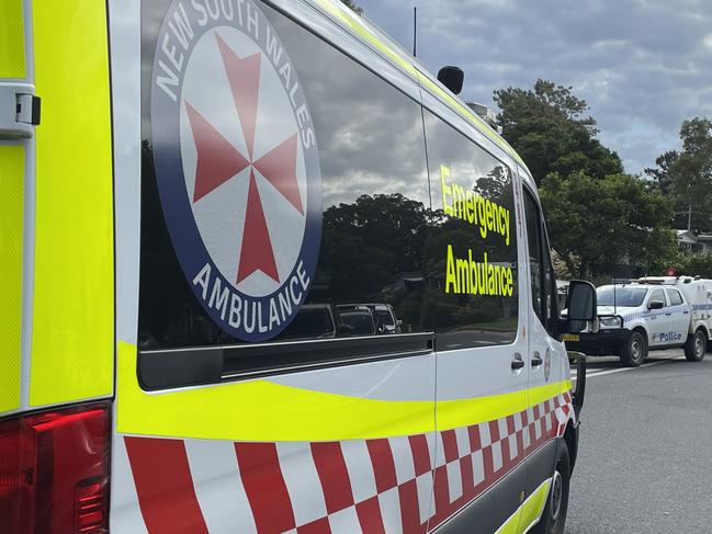 NSW Ambulance personnel at the scene near Hungry Head, Urunga, NSW. Picture: Janine Watson