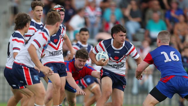 Darcy Smith with possession for the Central Coast Roosters in the Andrew Johns Cup Grand Final. Picture: Sue Graham