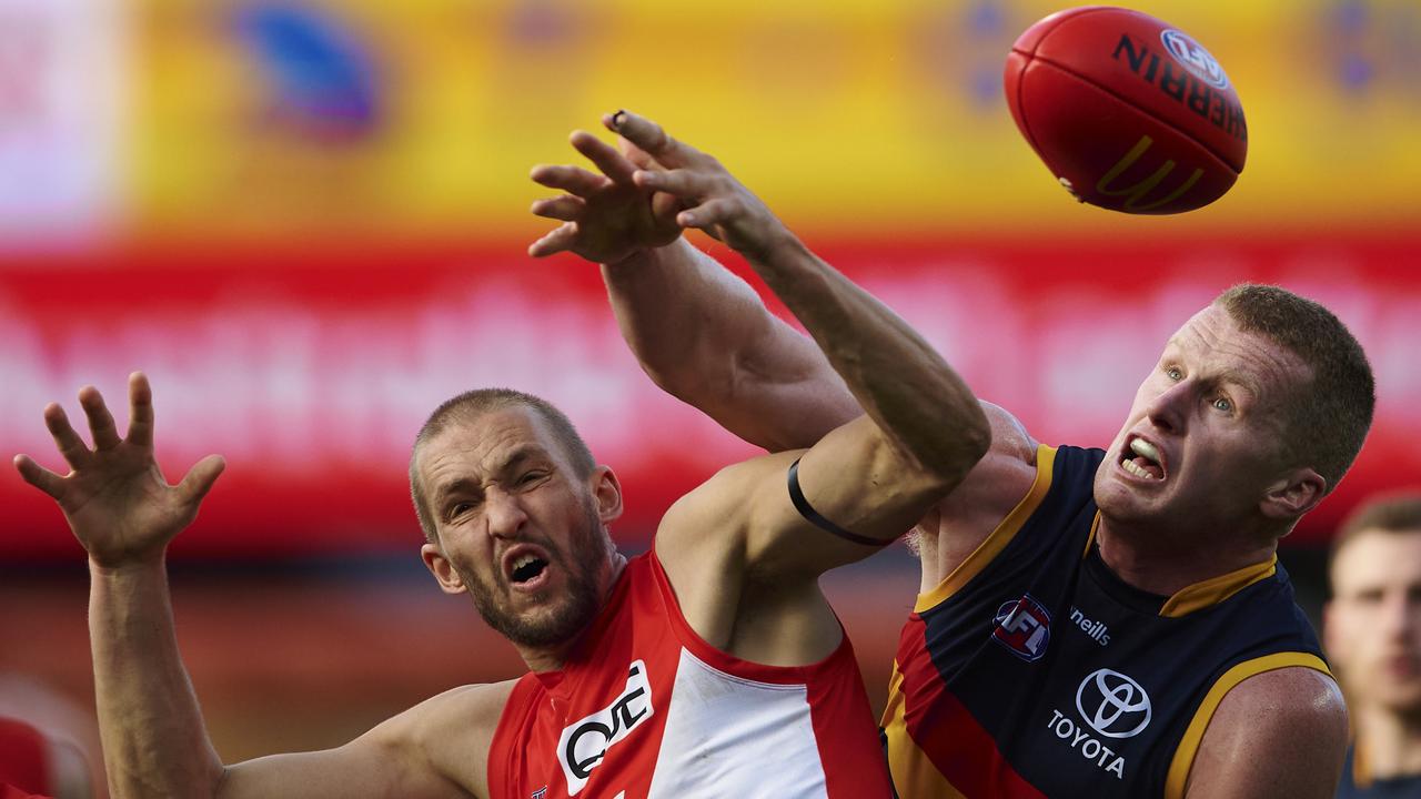 Sam Reid, competing in the ruck against Adelaide’s Reilly O’Brien, revived his career this season after a long wait last year to score a new contract. Picture: Getty Images