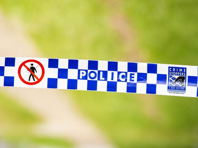 General photograph of Queensland Police and Crime Stoppers tape at crime scene, Sunday, March 8, 2020 (AAP Image/Richard Walker)