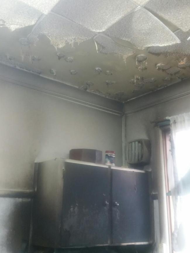 Fire, smoke and water damage in Pat Andrews' kitchen in Balgowlah.