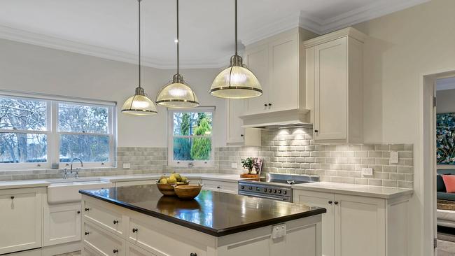 You can marvel at the cabinetry, the benchtop, the ceramic sink or even the light fittings, but it’s the subway tiles that take the cake for us on this one.