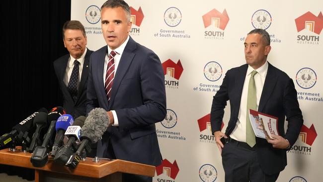 SA premier Peter Malinauskas with the head of the Steel Task Force, Bruce Carter, and Mining Minister Tom Koutsantonis.