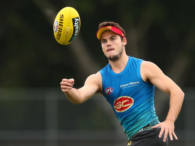 Jack Bowes catches during a Gold Coast Suns AFL training session on May 27, 2020 in Gold Coast, Australia. (Photo by Chris Hyde/Getty Images)