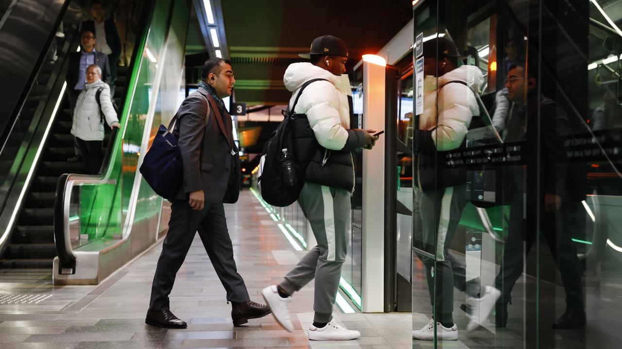 Pictured at Tallawong Station are commuters boarding one of the first Sydney Metro trains on its way back in to the city. The brand new Sydney Metro had its maiden run to Tallawong leaving Sydenham Station at 4.54am. Picture: Richard Dobson