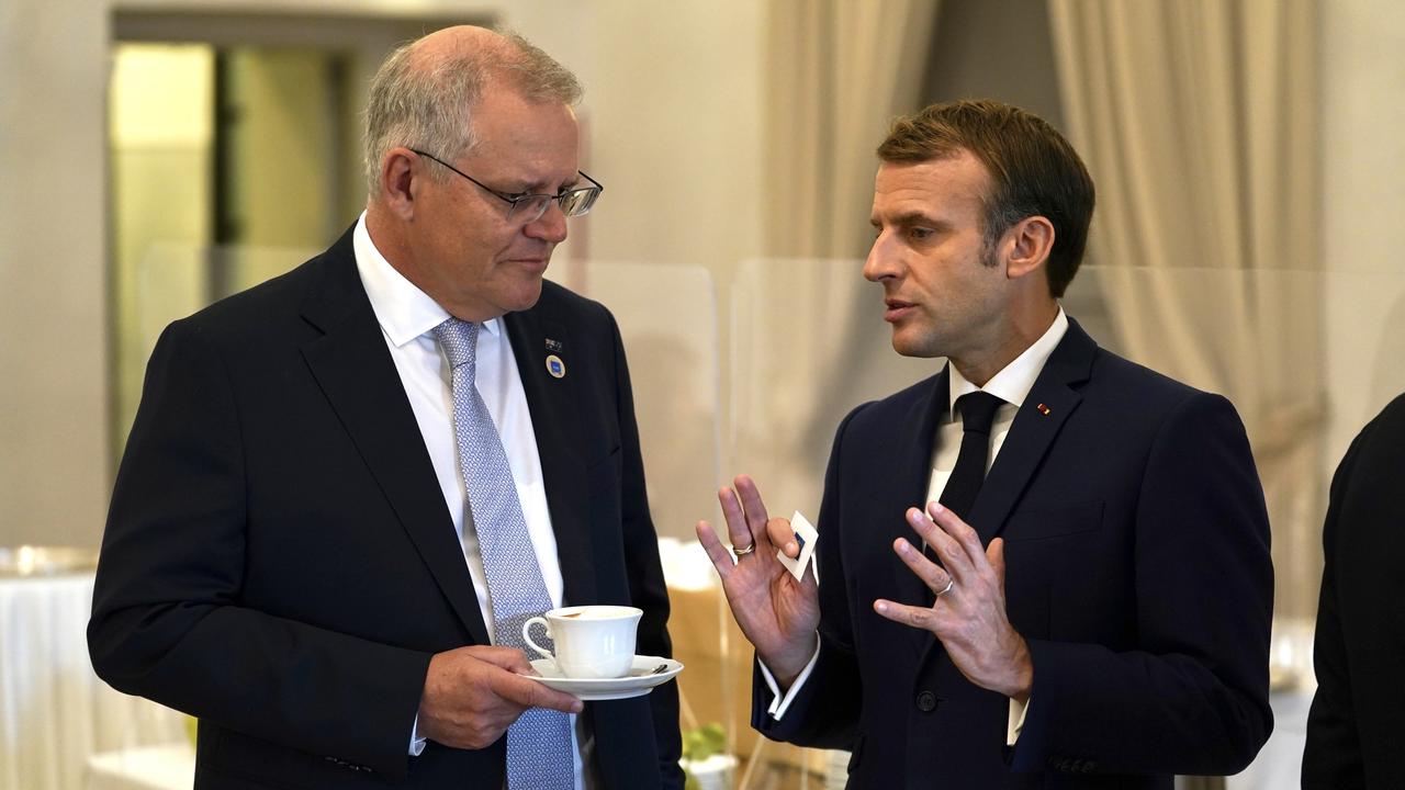 Australian Prime Minister Scott Morrison and French President Emmanuel Macron talk during the G20 in Rome in October. Picture: Adam Taylor