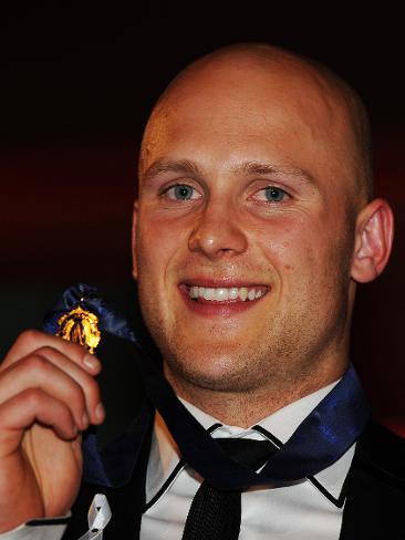 <p>Gary Ablett and the prized Brownlow Medal. Picture: Michael Dodge</p>