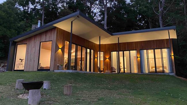 Glass frontage frames valley views at Springbrook's Heartwood Cabin Photo: Airbnb