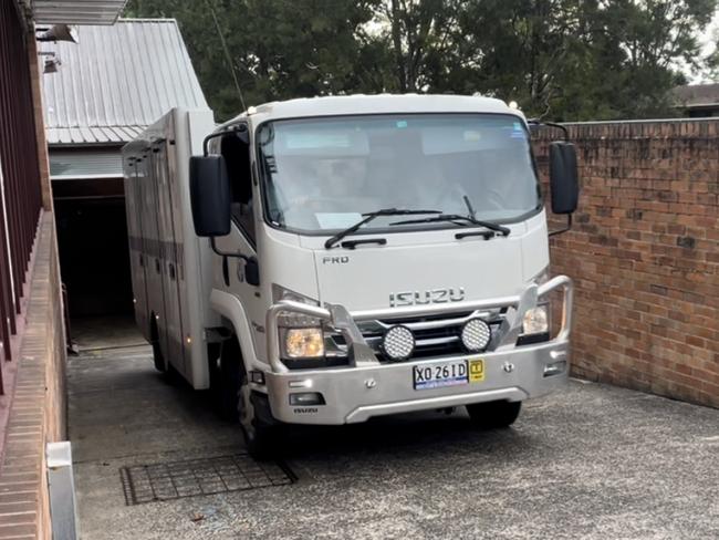 A corrective services caged truck leaving Waverley Police station on Friday evening, after Kurtley Beale was questioned and interviewed at the station. Picture: Jeremy Piper