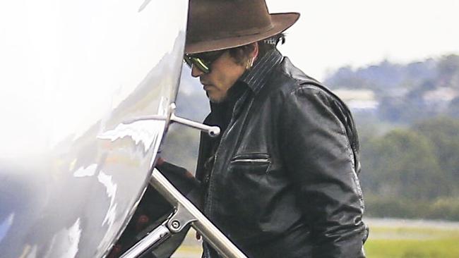 Johnny Depp boards a private charter flight at Gold Coast Airport to return home to Los Angeles. Photo: ©MEDIA-MODE.COM