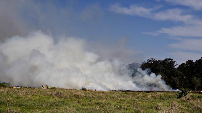 Grass fire at Mudgeeraba Rd, Mudgeeraba. Photo: Jerad Williams