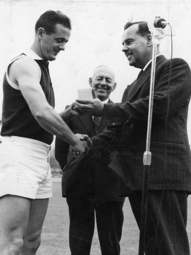 Jim Deane being presented with the Magarey Medal in 1953.