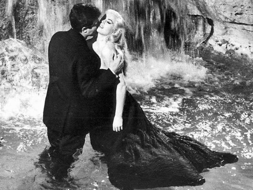 The famous <i>La Dolce Vita</i> scene starring Marcello Mastroianni and Anita Ekberg at ‘Fontana di Trevi’ – the Trevi Fountain. It was filmed in 1960.