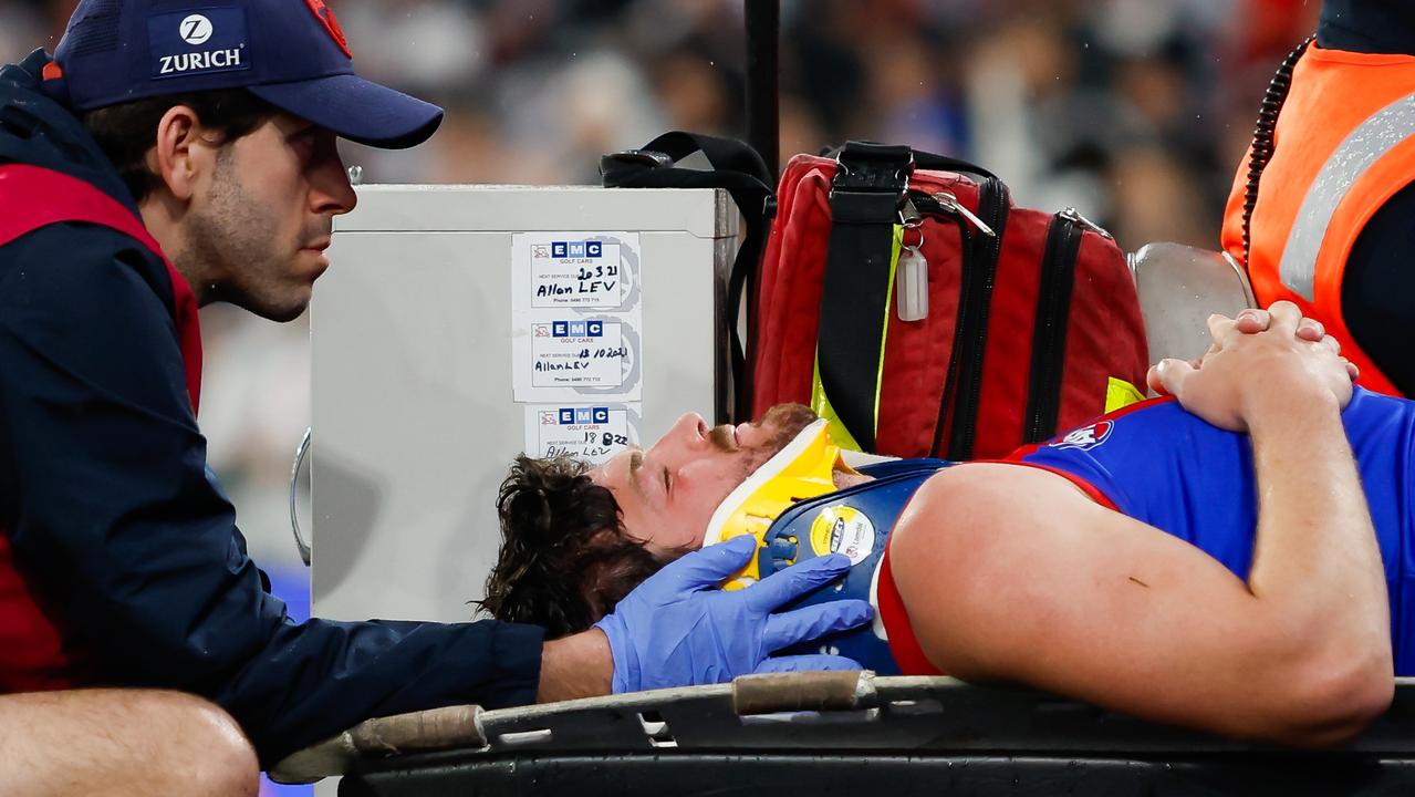 Angus Brayshaw was stretchered off after the hit. Picture: Dylan Burns/AFL Photos via Getty Images