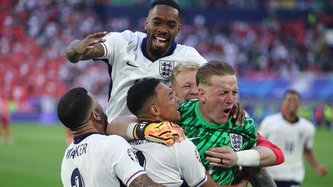 Pickford was the hero as England went through. (Photo by Dean Mouhtaropoulos/Getty Images)