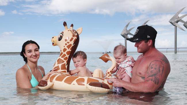 Sarah Castini, Tatum Castini, 2, Amarni Castini, 4 months, and Zehnyn Castini from Gordonvale took a dip in the Esplanade lagoon to cool off`. Picture: Brendan Radke