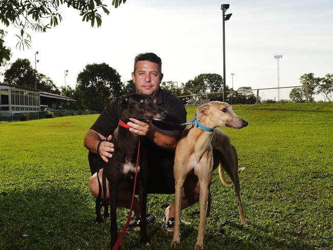 Queensland greyhound trainer Tom Tzouvelis with past star runners he has brought to Darwin, Soft Sand and Del Rey. Tzouvelis’ Sunburst won the Chief Minister’s Cup at Winnellie Park last Sunday before it was ruled a no-result. Picture: Keri Megelus