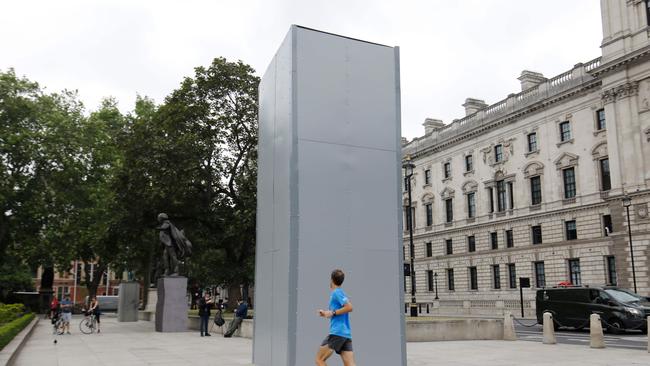 A statue of British wartime Prime Minister Winston Churchill in London has been boarded up. Picture: Tolga Akmen/AFP